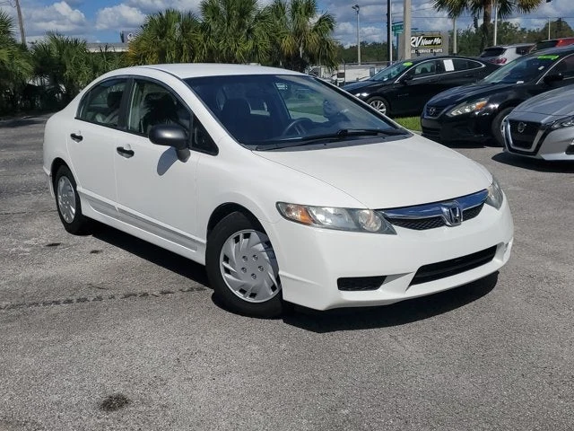 2010 Honda Civic Sdn DX-VP, White, front three-quarter view